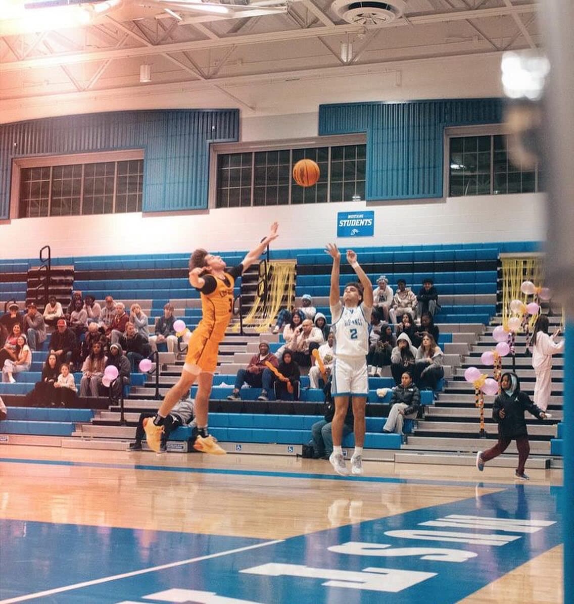 mh mustngs basketball team wearing custom sublimated royal and white jerseys by Final Game Sports in Tracy California.